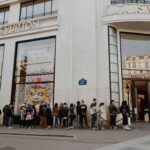 people queue infront of store